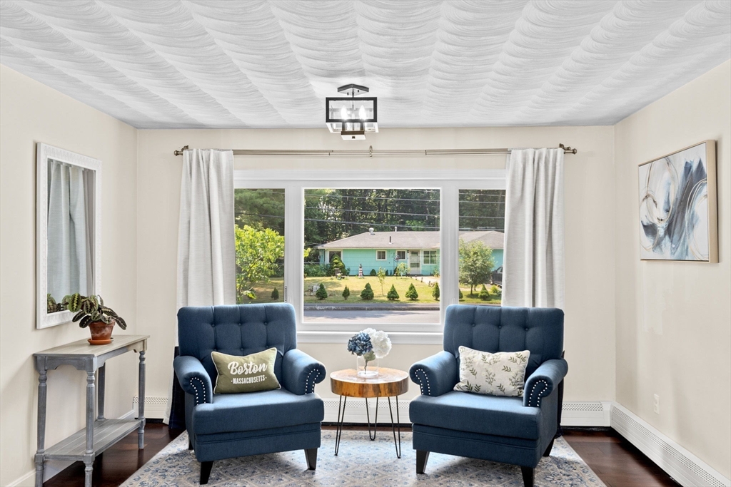13 Pinewood Drive Framingham, MA 01701 - Photo 7 of 21 a living room with furniture and a window