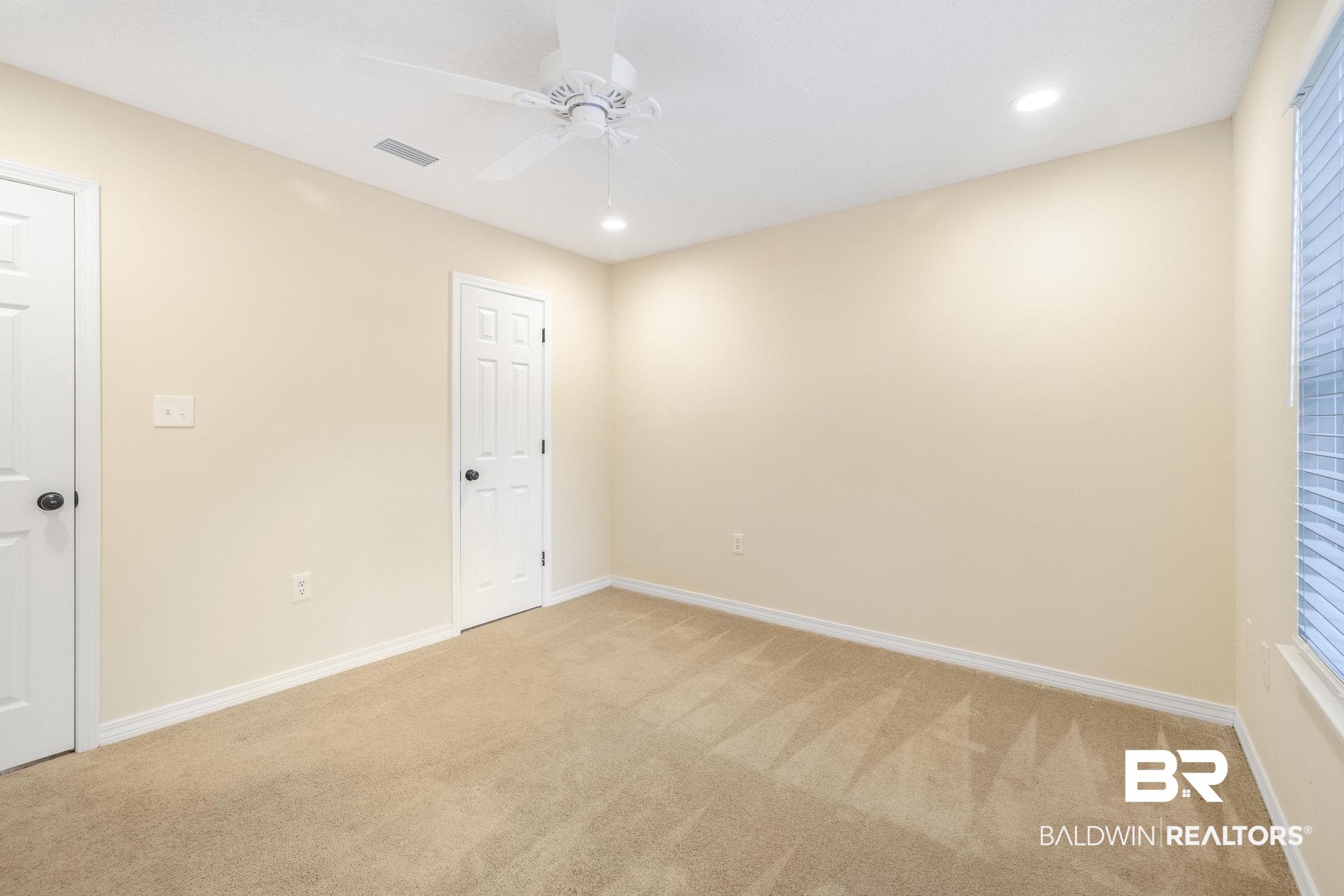 140 Hope Drive Daphne, AL 36526 - Photo 36 of 54 Unfurnished bedroom with light colored carpet, recessed lighting, and ceiling fan