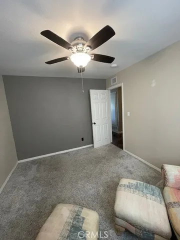 a view of backyard with table and outdoor seating