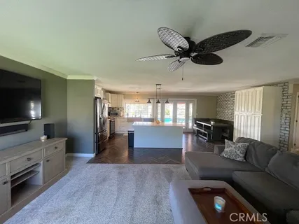 a kitchen with counter top space and sink