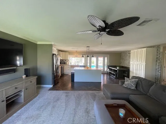 a kitchen with counter top space and sink