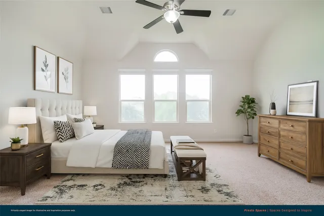 a bedroom with a bed and a dresser