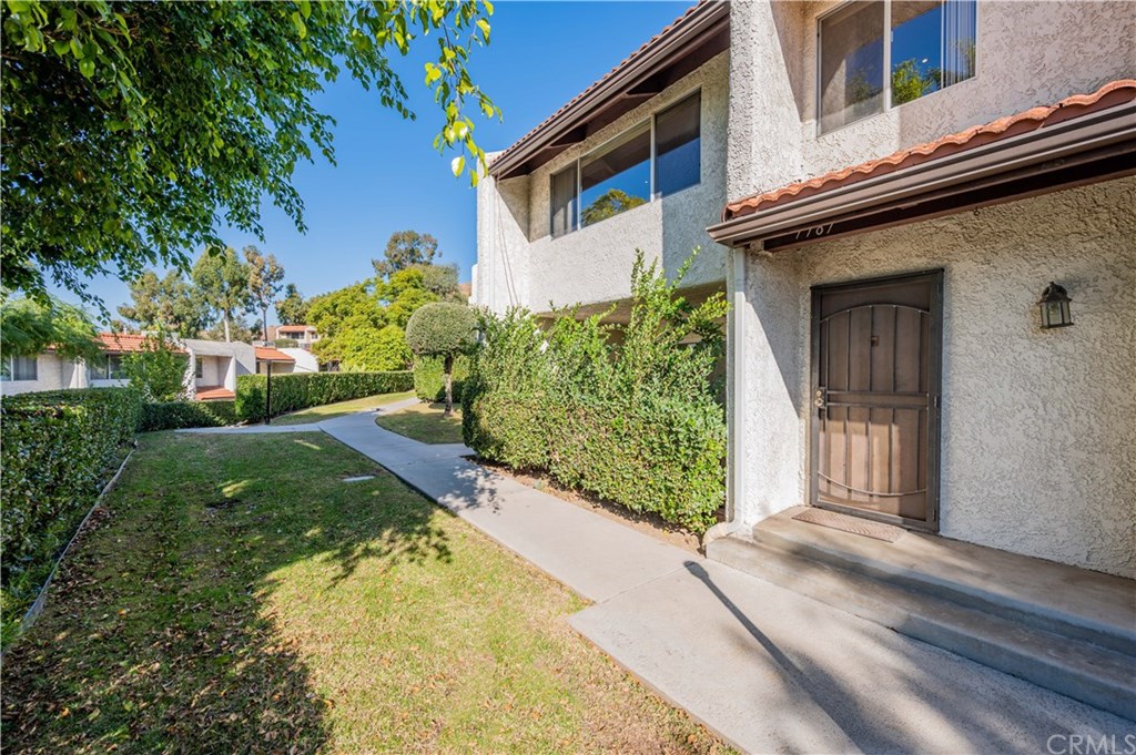 7787 Vía Cassano Burbank, CA 91504 - Photo 1 of 1 Main entry door. Front patio with privacy hedges.