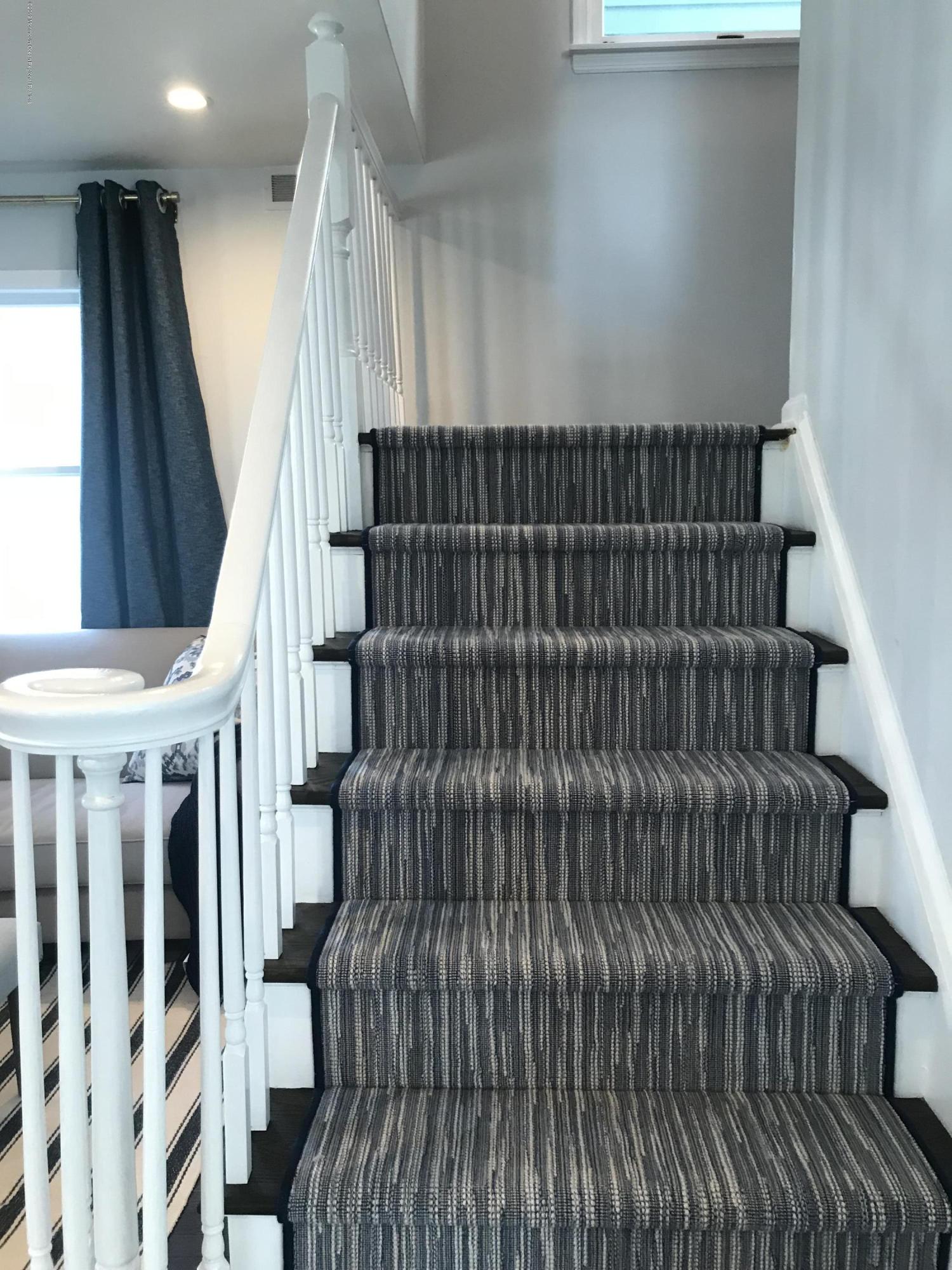 16 Webb Avenue Ocean Grove, NJ 07756 - Photo 15 of 32 a view of entryway with wooden floor