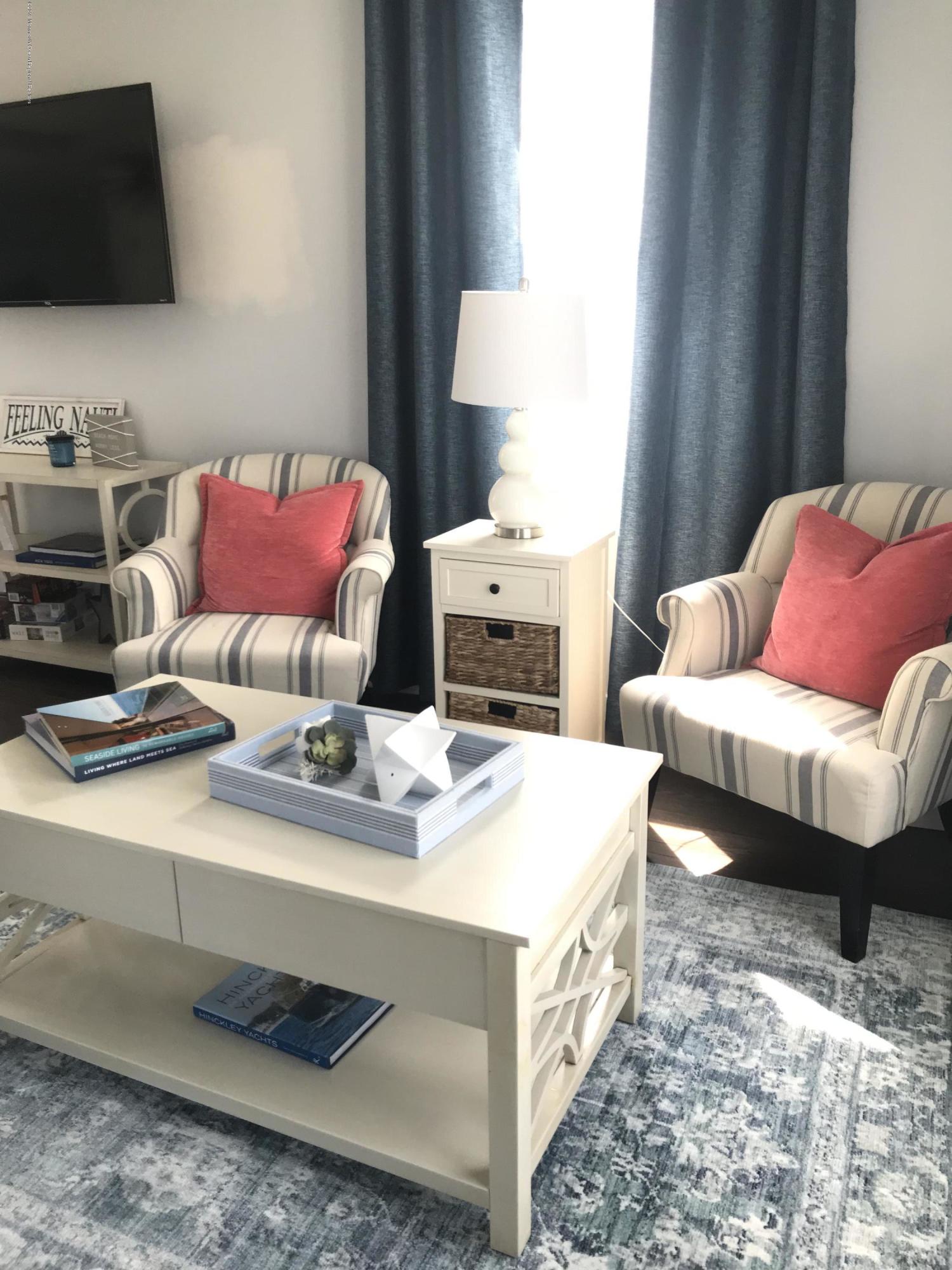 16 Webb Avenue Ocean Grove, NJ 07756 - Photo 2 of 32 a living room with furniture and a flat screen tv