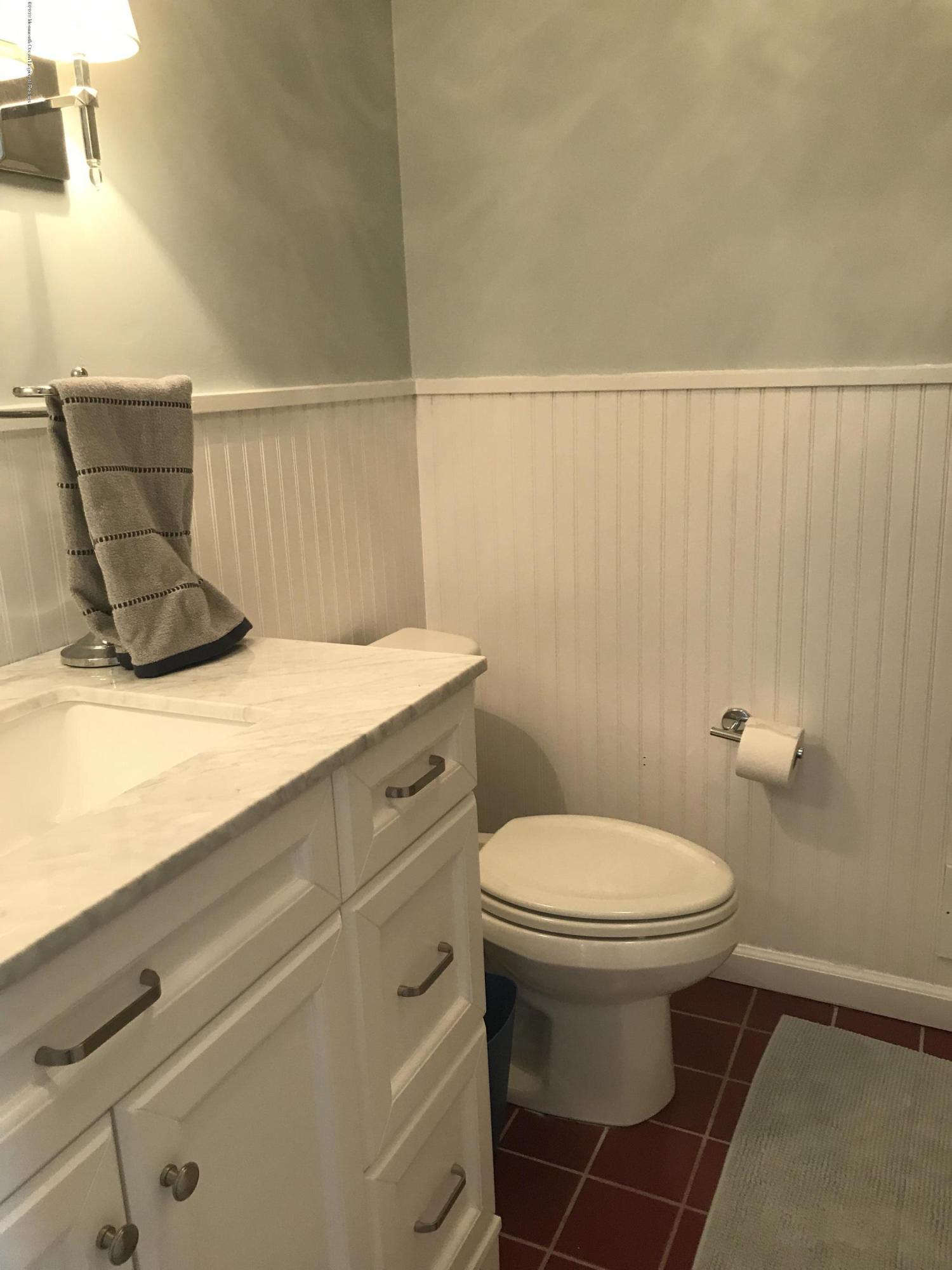 16 Webb Avenue Ocean Grove, NJ 07756 - Photo 21 of 32 a bathroom with a sink and a toilet