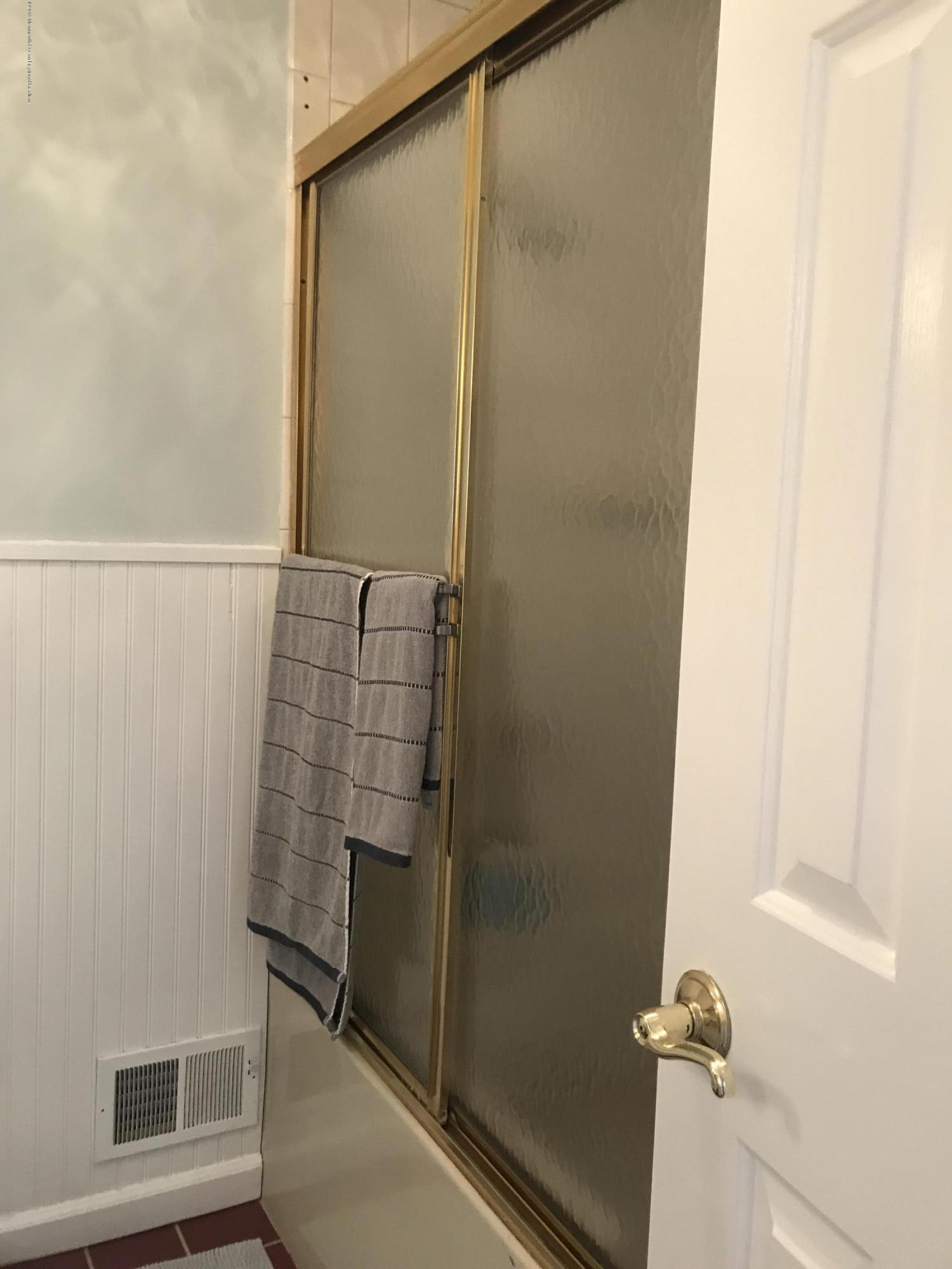 16 Webb Avenue Ocean Grove, NJ 07756 - Photo 22 of 32 a bathroom with a shower