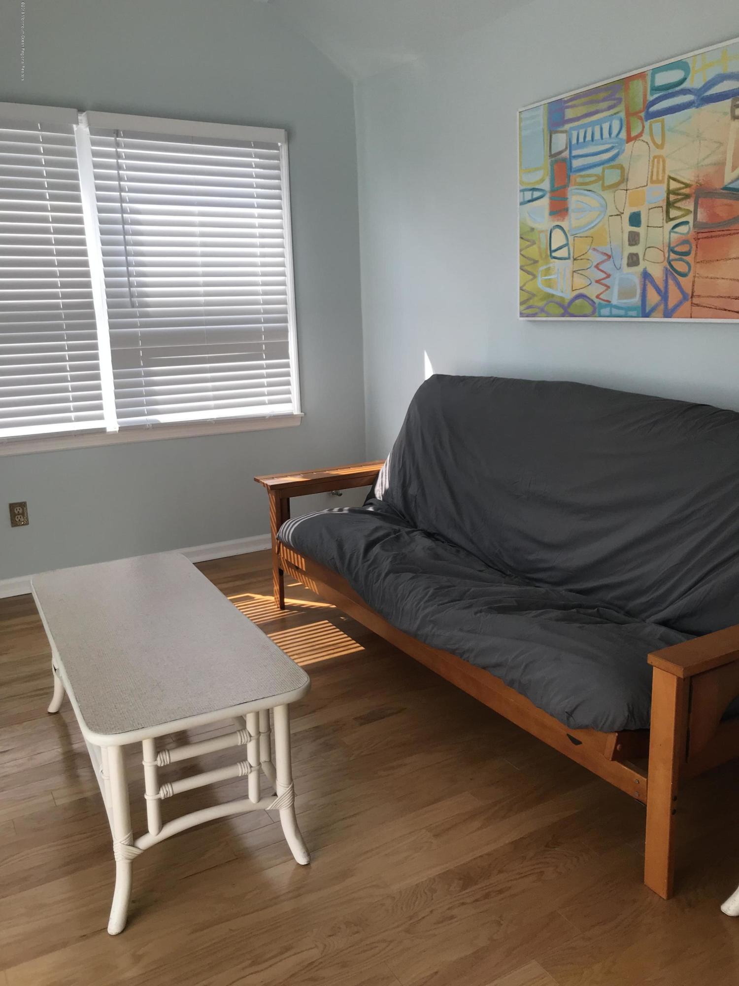 16 Webb Avenue Ocean Grove, NJ 07756 - Photo 29 of 32 a living room with furniture and a window