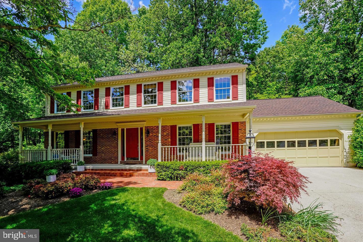 12035 Lake Newport Road Reston , VA 20170 - Photo 1 of 1 a front view of a house with garden