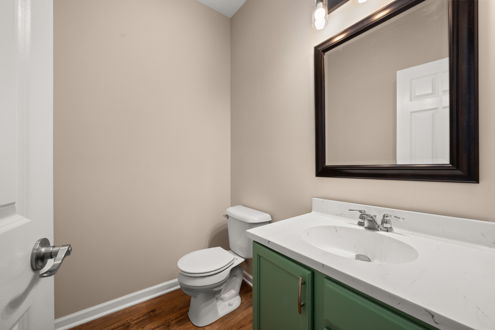 3705 Green Tree Lane DeKalb, IL 60115 - Photo 12 of 31 a bathroom with a sink and a toilet