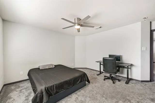 a bathroom with a double vanity sink and mirror