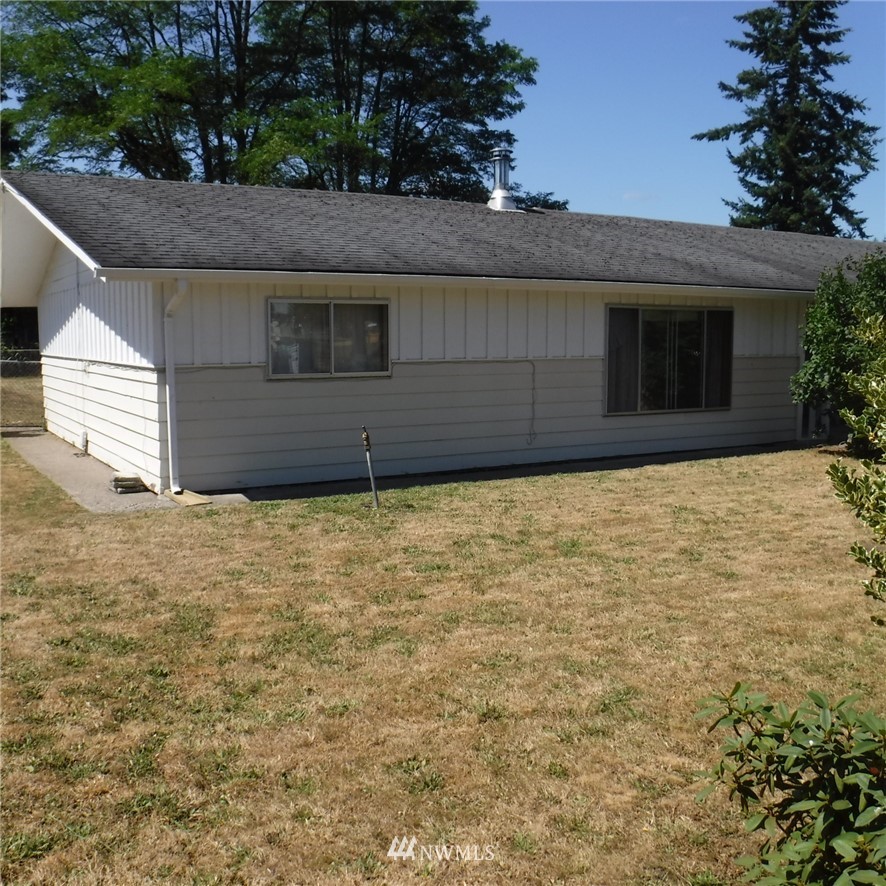 18107 Corvallis Street Southwest Rochester, WA 98579 - Photo 1 of 17 a front view of a house with a yard