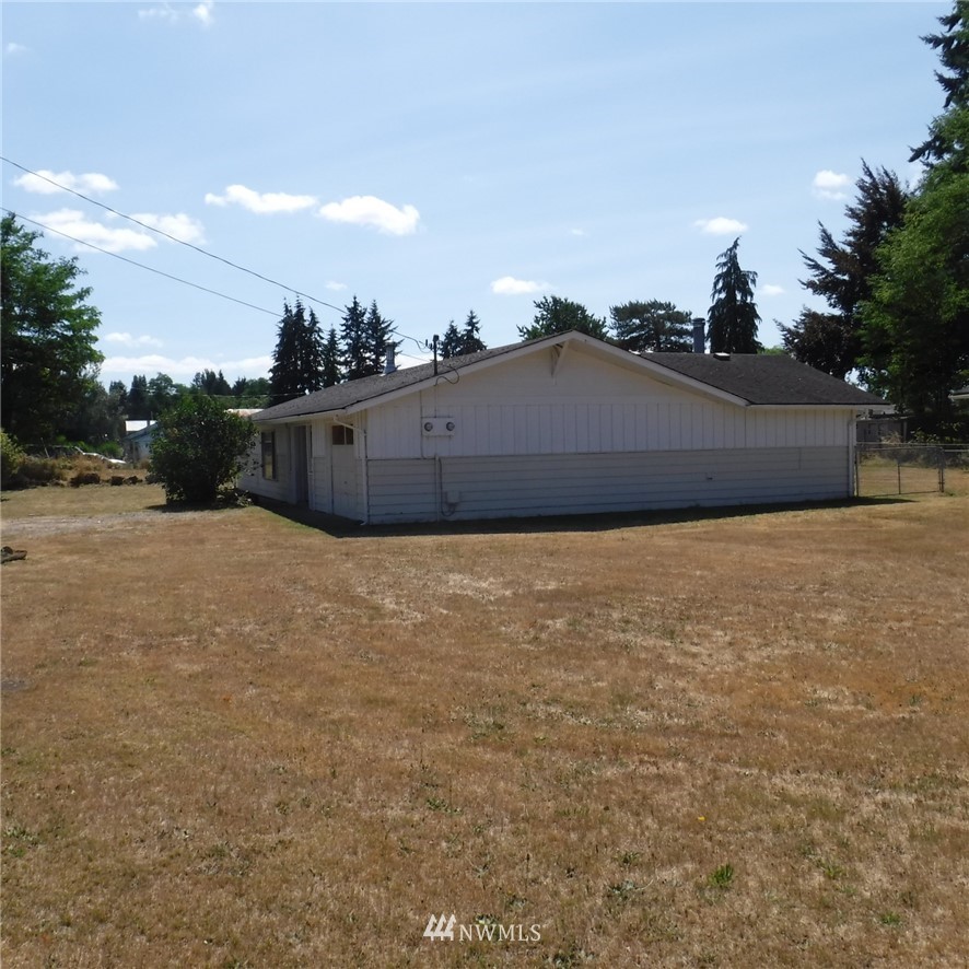 18107 Corvallis Street Southwest Rochester, WA 98579 - Photo 5 of 17 a view of a houses with a big yard