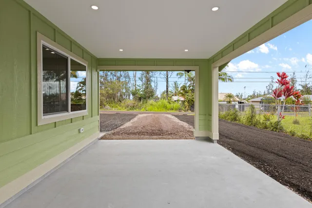 a open hall with an outdoor space and balcony