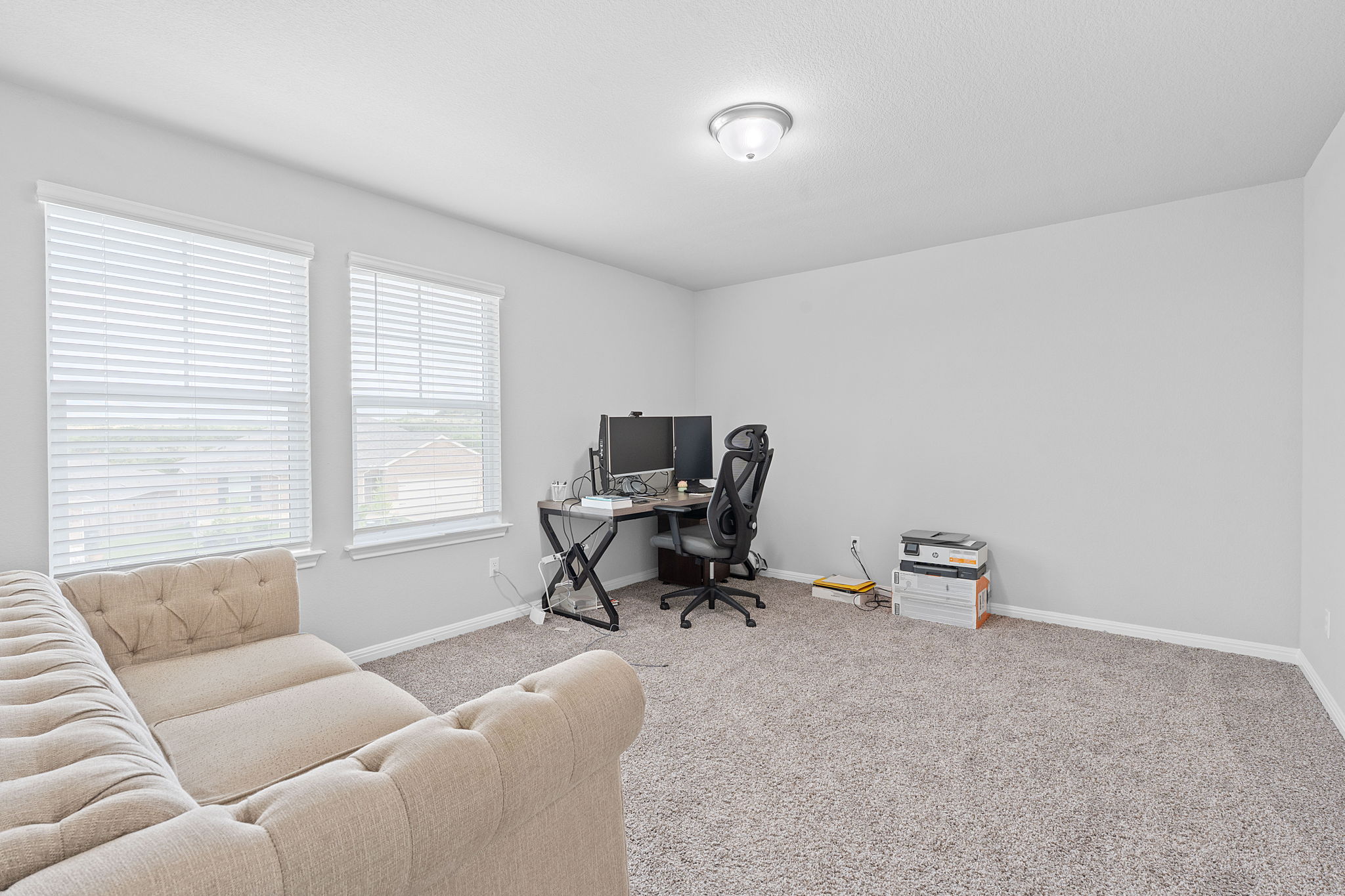 571 Sue Peaks Loop Dripping Springs, TX 78620 - Photo 9 of 29 a work room with furniture and a window