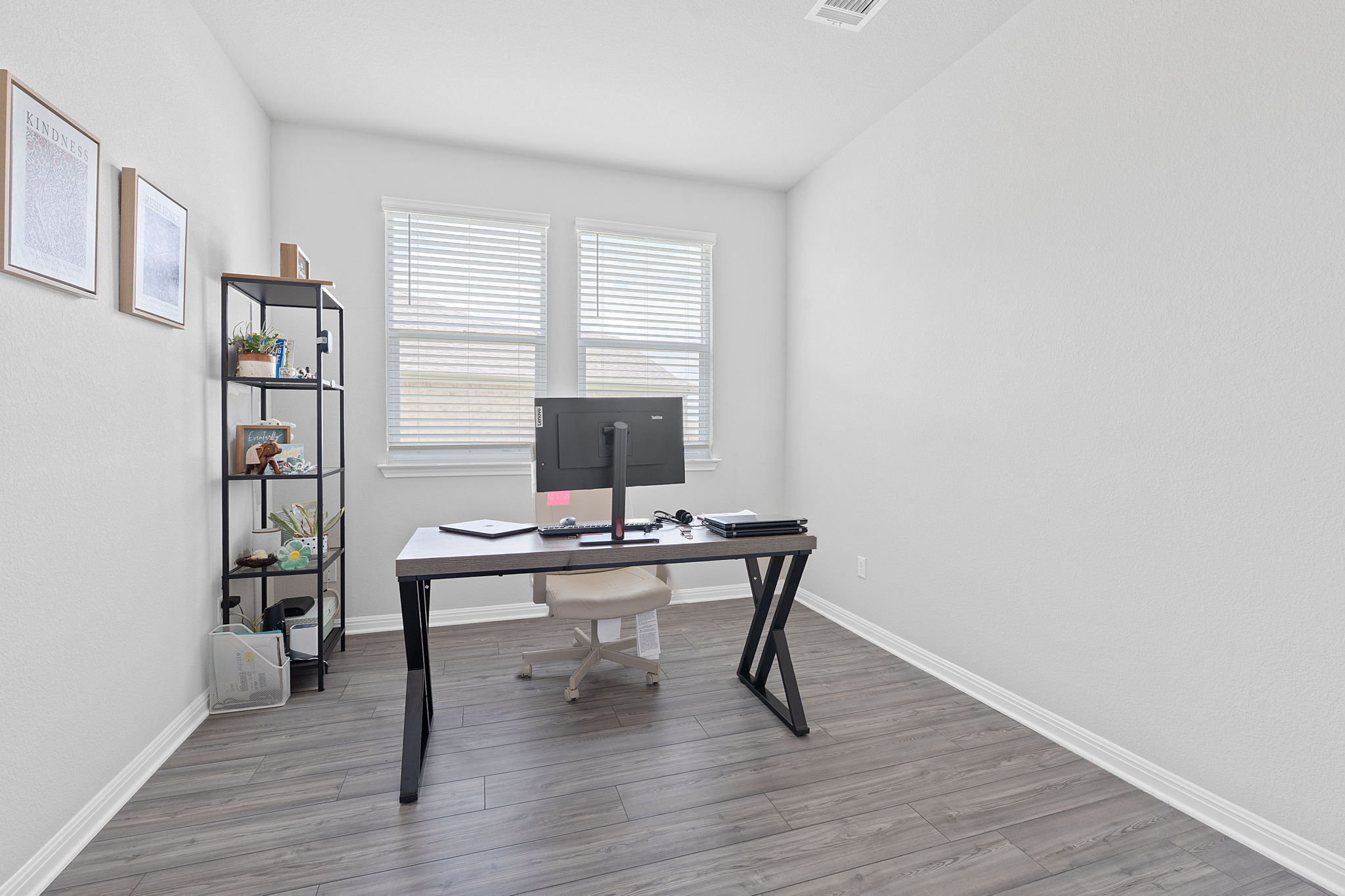 571 Sue Peaks Loop Dripping Springs, TX 78620 - Photo 10 of 29 a view of a workspace with furniture and a window