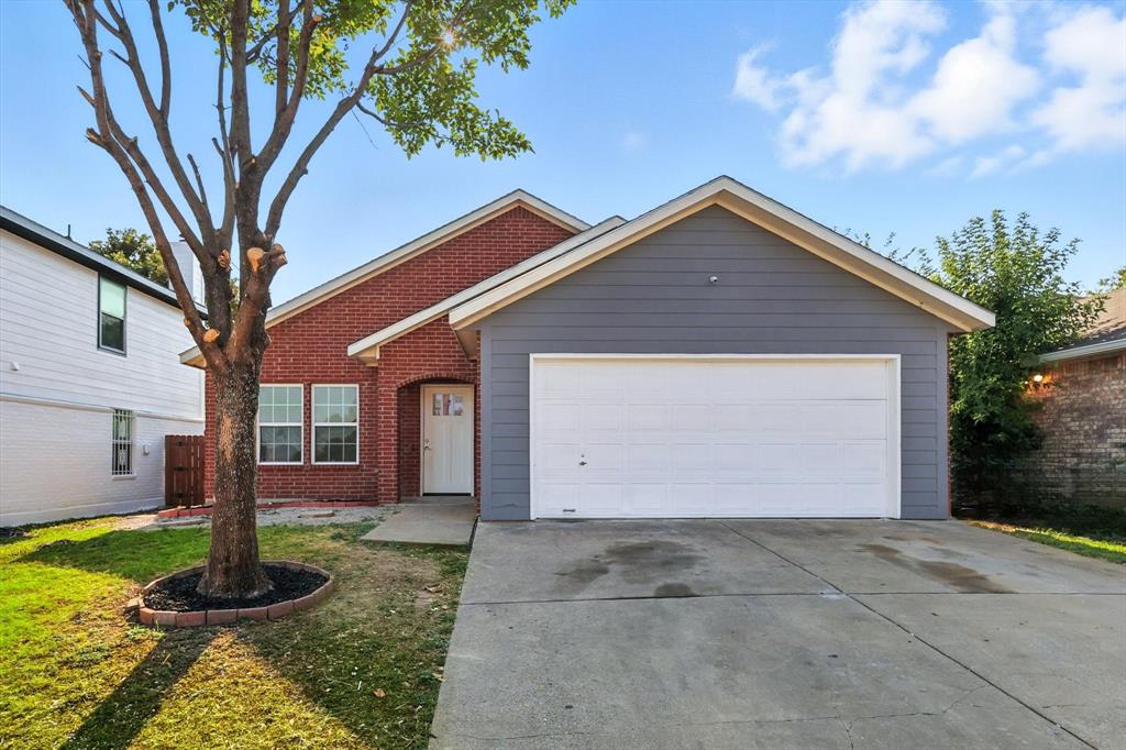 3335 Tioga Street Dallas, TX 75241 - Photo 1 of 1 a front view of a house with garden