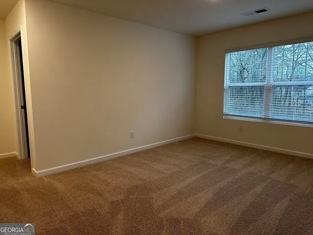 an empty room with a window