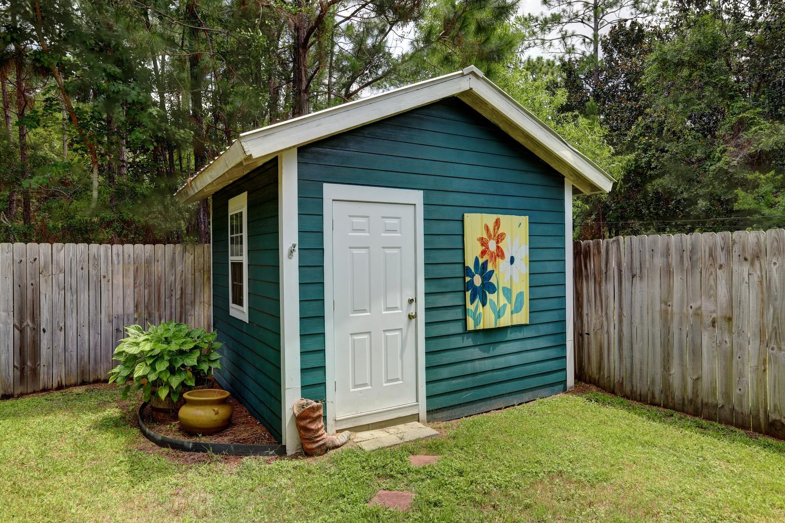 388 Churchill Bayou Road Santa Rosa Beach, FL 32459 - Photo 5 of 23 a backyard of a house with lots of green space
