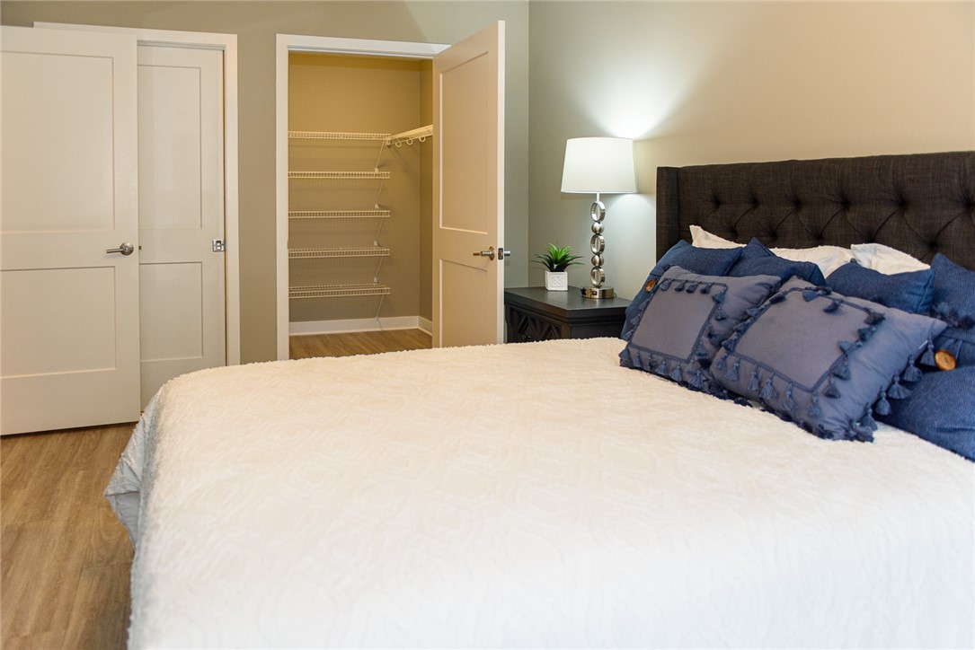 1282 Lehigh Station Road, Unit 3102 Henrietta, NY 14467 - Photo 10 of 17 Typical primary bedroom with ensuite bath & walk-i