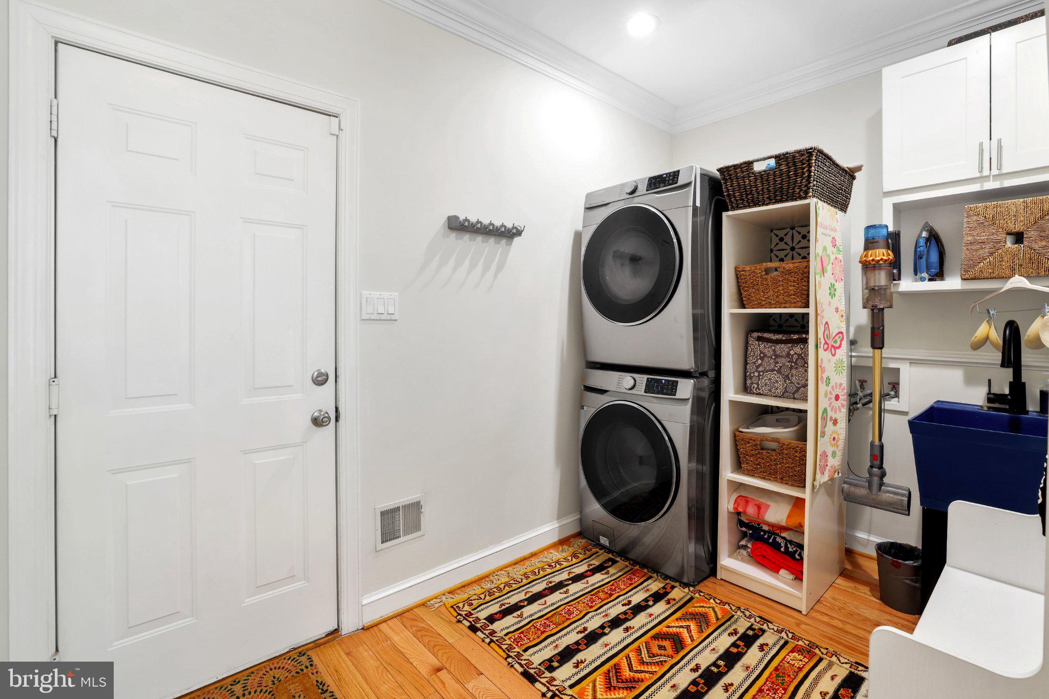 6732 Churchill Road McLean, VA 22101 - Photo 22 of 61 Stylish laundry nook with modern appliances.