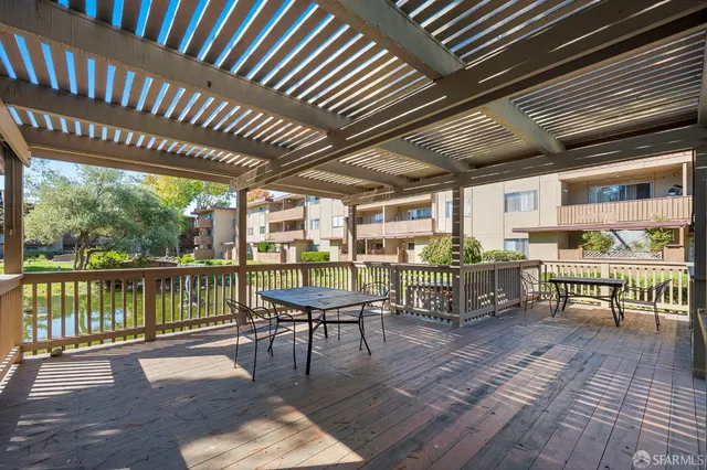 a view of swimming pool from a garden