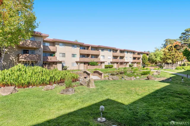 an aerial view of a city with lots of residential buildings