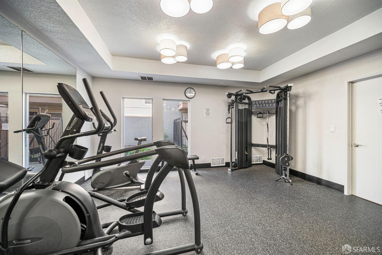 1327 Webster Street, Unit B210 Alameda, CA 94501 - Photo 37 of 54 a view of a room with gym equipment
