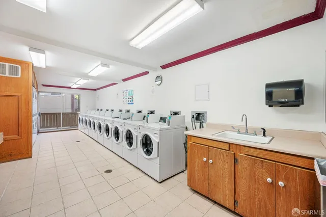 a sign that is on a brick wall