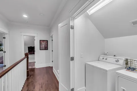 a view of a storage & utility room with wooden floor