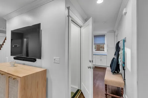 a bathroom with a sink vanity and mirror