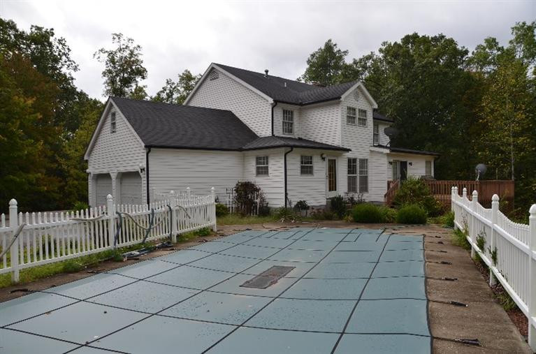 655 Caudill Road Stanton, KY 40380 - Photo 14 of 60 Pool leads to the utility room or onto t