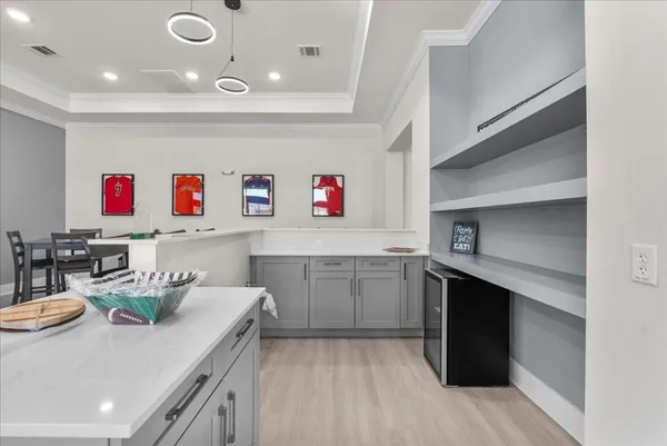 a view of a living room and kitchen