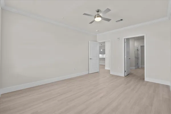 an empty room with a bathroom