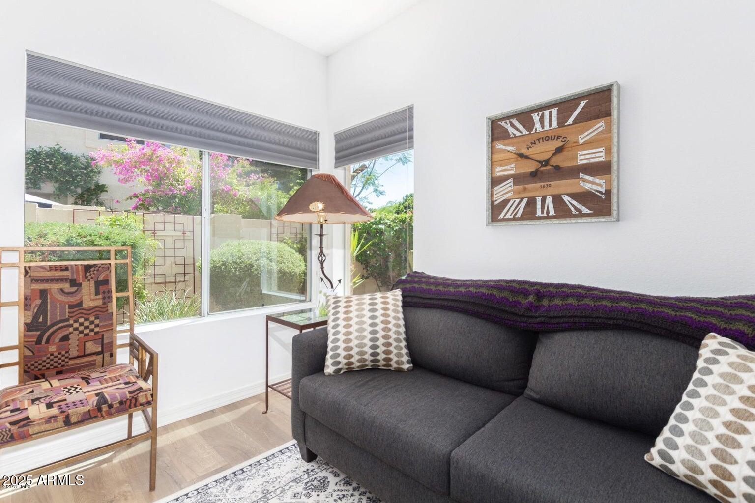 8841 South 51st Street, Unit 1 Phoenix, AZ 85044 - Photo 14 of 23 a living room with furniture and a large window