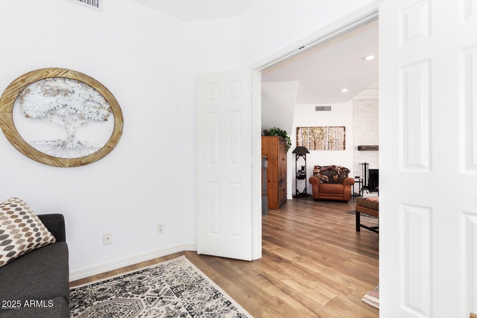 8841 South 51st Street, Unit 1 Phoenix, AZ 85044 - Photo 15 of 23 a view of a bedroom with furniture and a window