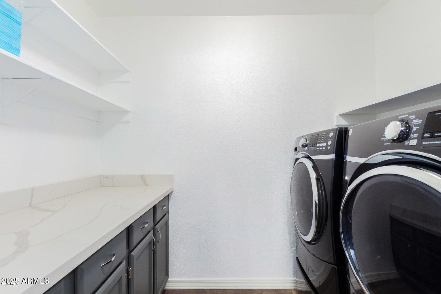 8841 South 51st Street, Unit 1 Phoenix, AZ 85044 - Photo 23 of 23 a utility room with dryer and washer