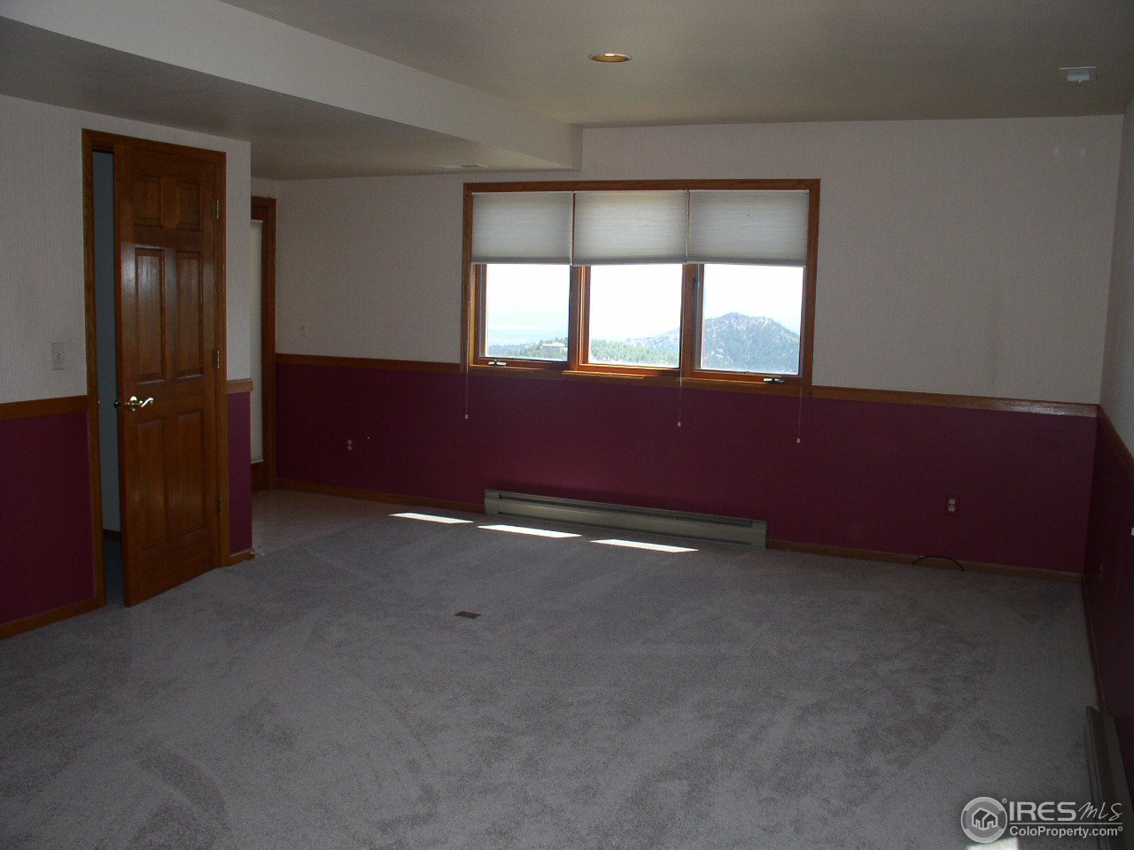 356 Ridgeview Lane Boulder, CO 80302 - Photo 15 of 25 an empty room with windows
