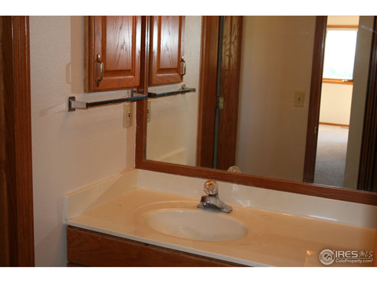 356 Ridgeview Lane Boulder, CO 80302 - Photo 23 of 25 a bathroom with a sink and a mirror