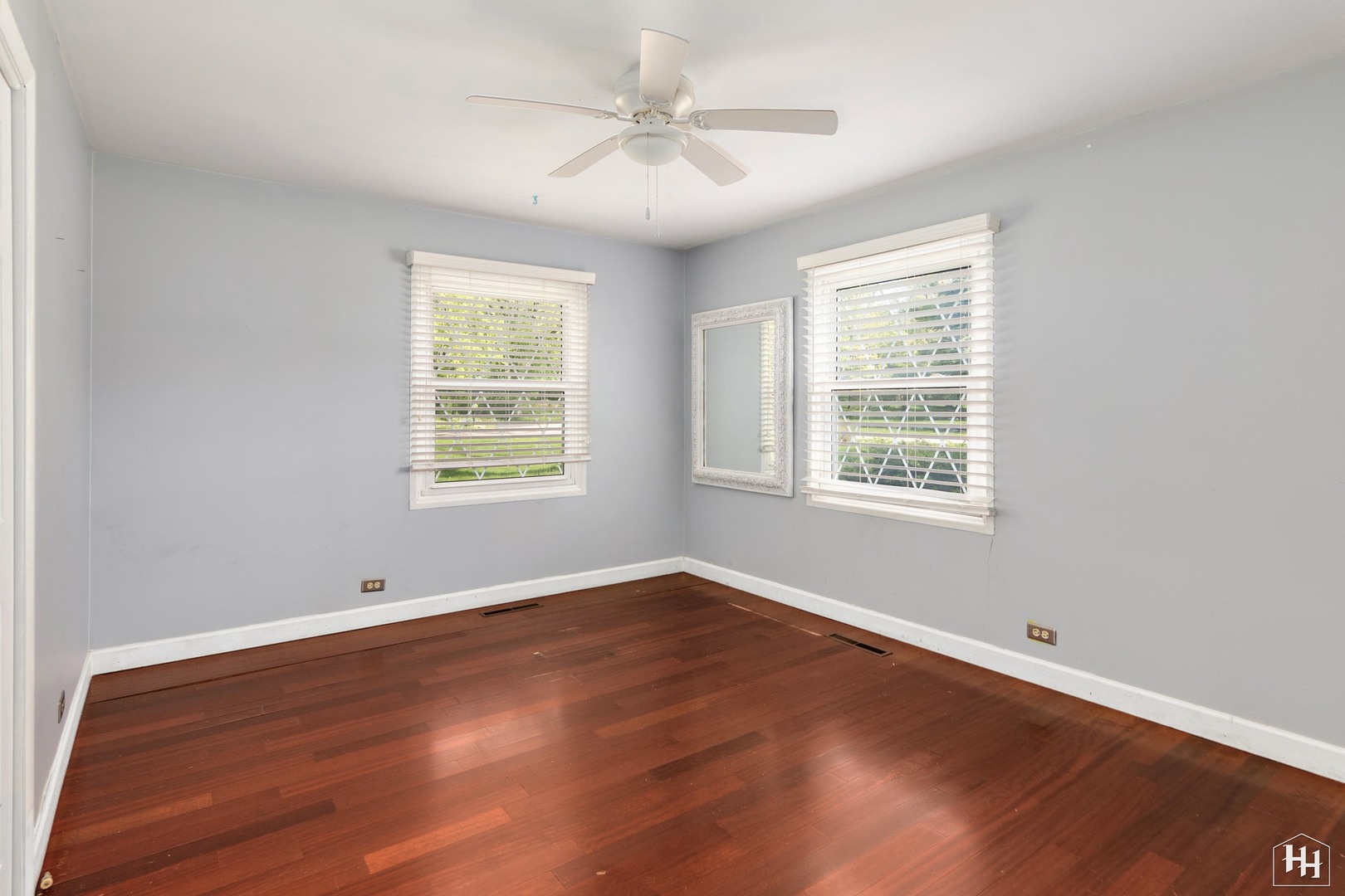 239 Brookbridge Road Trout Valley, IL 60013 - Photo 14 of 24 an empty room with wooden floor and windows