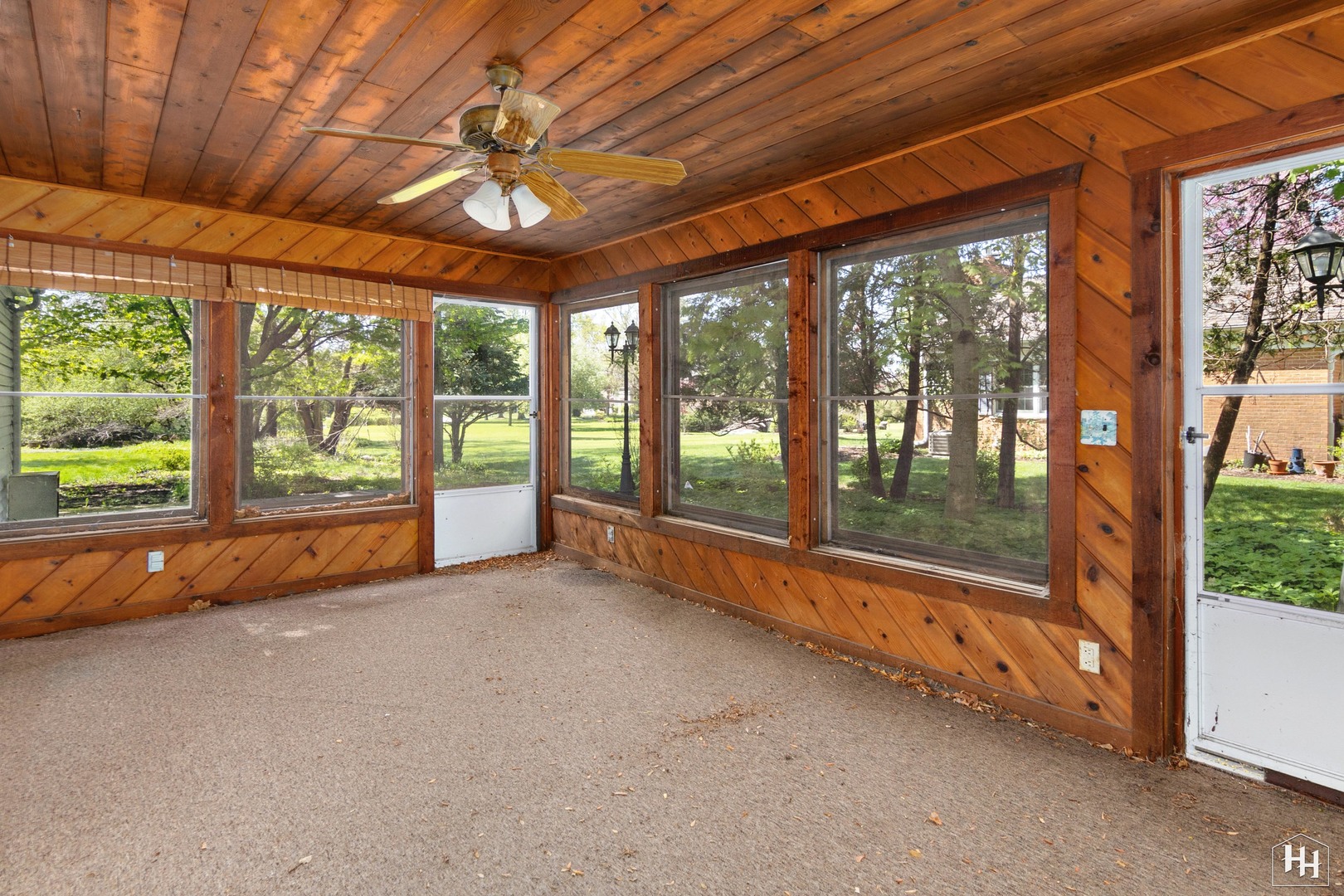 239 Brookbridge Road Trout Valley, IL 60013 - Photo 18 of 24 a view of an empty room with wooden floor and a sliding door