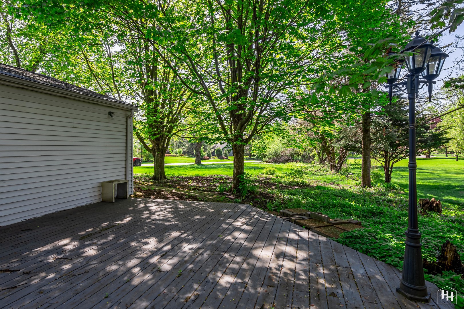 239 Brookbridge Road Trout Valley, IL 60013 - Photo 21 of 24 a view of a backyard with large trees
