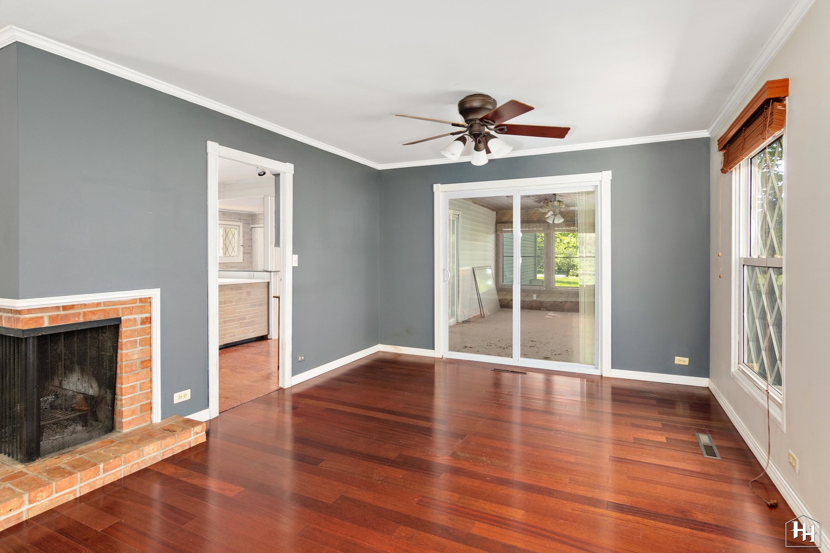 239 Brookbridge Road Trout Valley, IL 60013 - Photo 5 of 24 a view of an empty room with a fireplace and a window