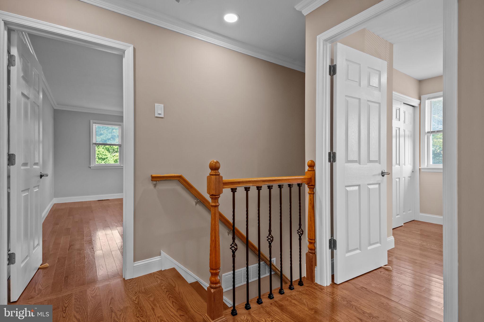 1838 Sheri Road Bensalem, PA 19020 - Photo 30 of 43 a view of a hallway with wooden floor and stairs
