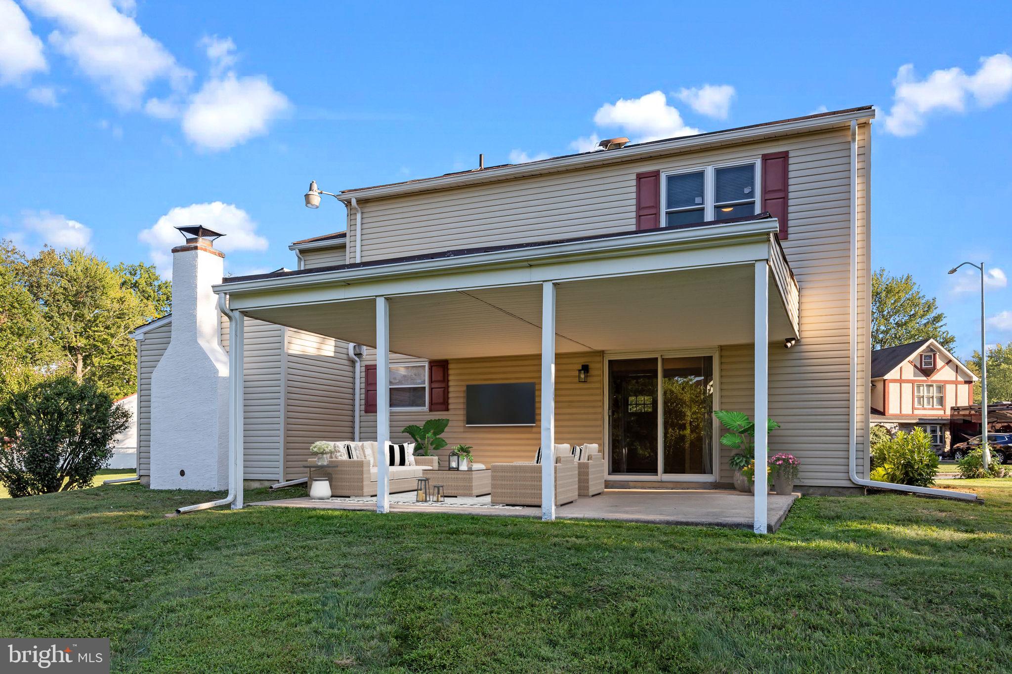 1838 Sheri Road Bensalem, PA 19020 - Photo 31 of 43 a front view of a house with a garden and porch