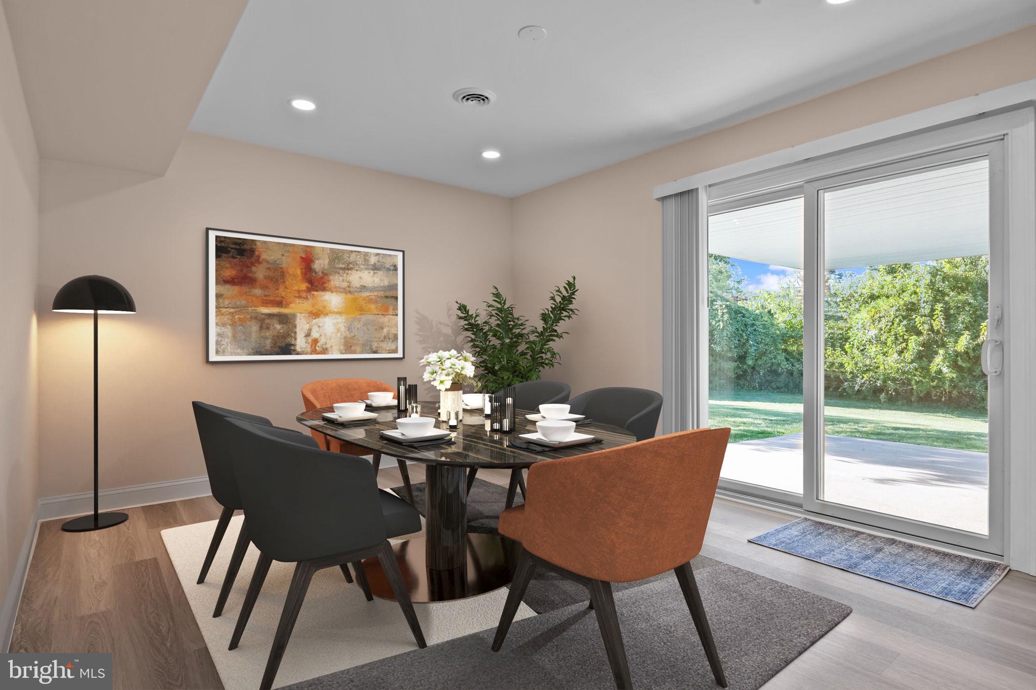 1838 Sheri Road Bensalem, PA 19020 - Photo 9 of 43 a dining room with furniture and wooden floor