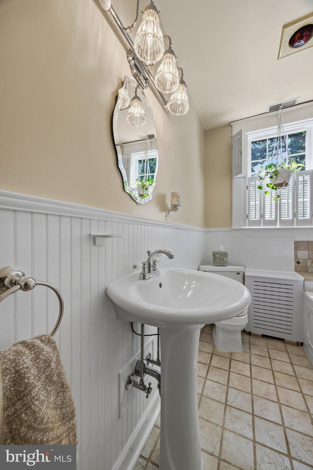 522 Old Hammonds Ferry Road Linthicum Heights, MD 21090 - Photo 29 of 109 Elegant bathroom with vintage charm.
