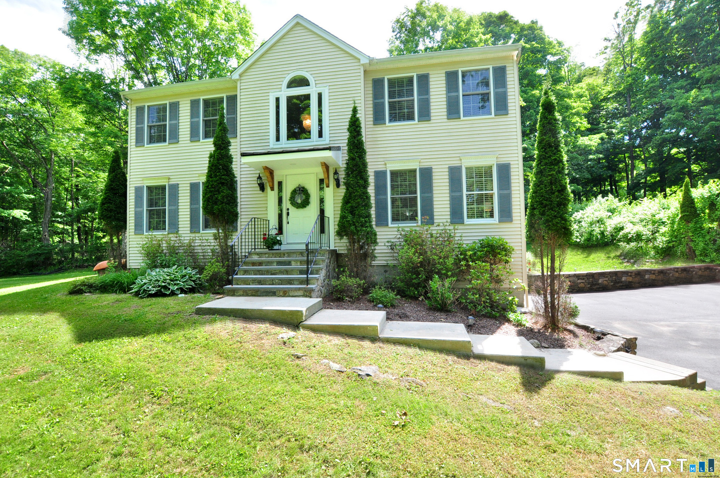 12 Revere Road Bridgewater, CT 06752 - Photo 6 of 40 a front view of a house with a yard