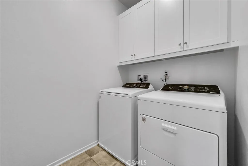 5584 Kate Way, Unit 10 Fontana, CA 92335 - Photo 19 of 42 a utility room with dryer and washer
