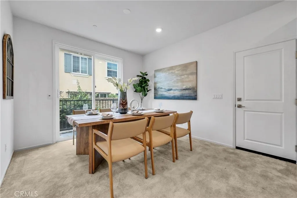 5584 Kate Way, Unit 10 Fontana, CA 92335 - Photo 4 of 42 a dining room with furniture and window